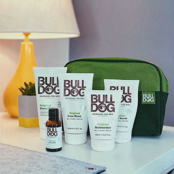 A selection of Bull Dog Skincare for Men on a white desk
